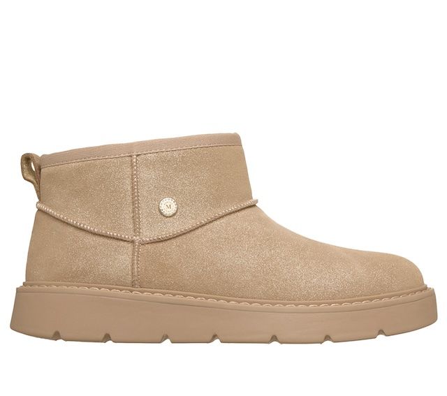 An anklehigh suede boot with a flat sole and a simple design
