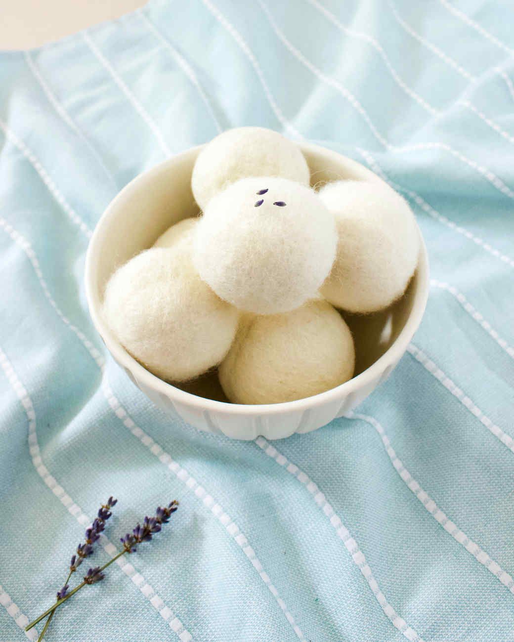 bowl of wool dryer balls and lavender sprigs