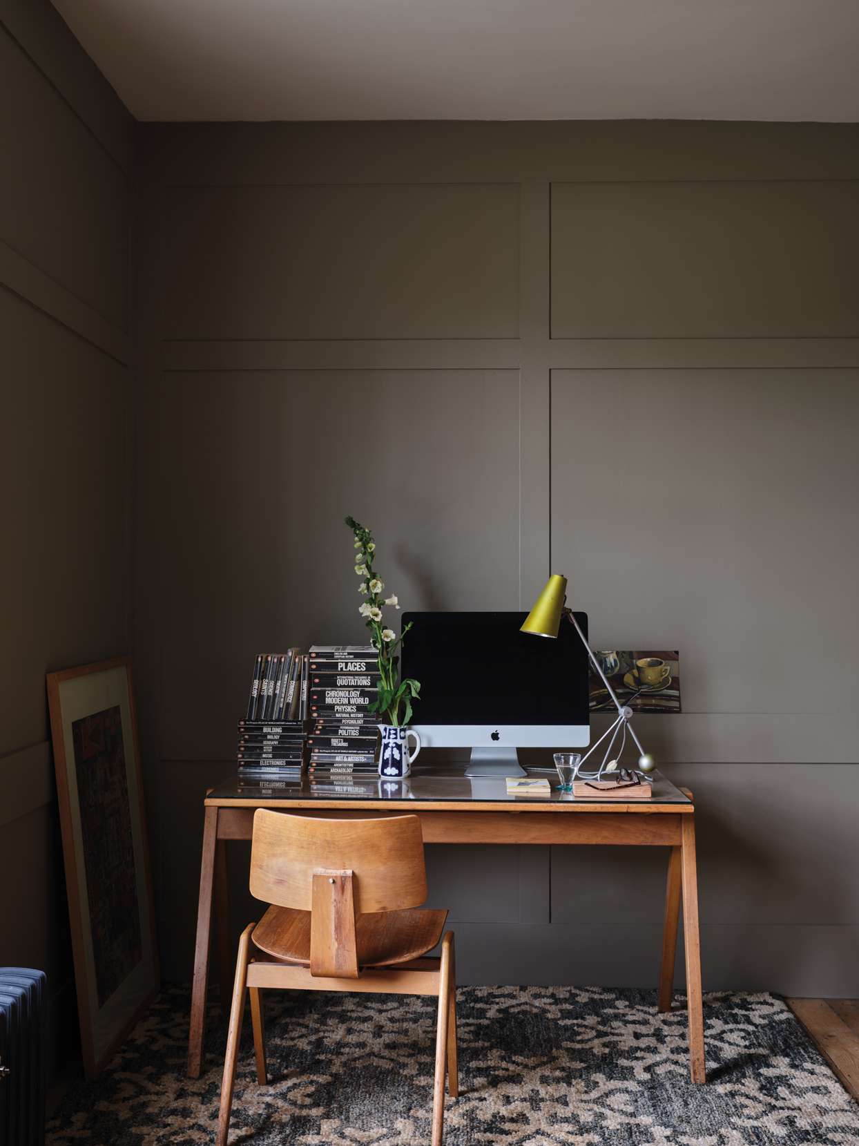wooden desk in brown-painted at home office