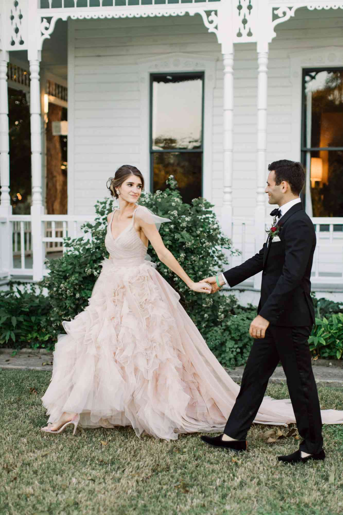 wedding couple portraits walking mansion