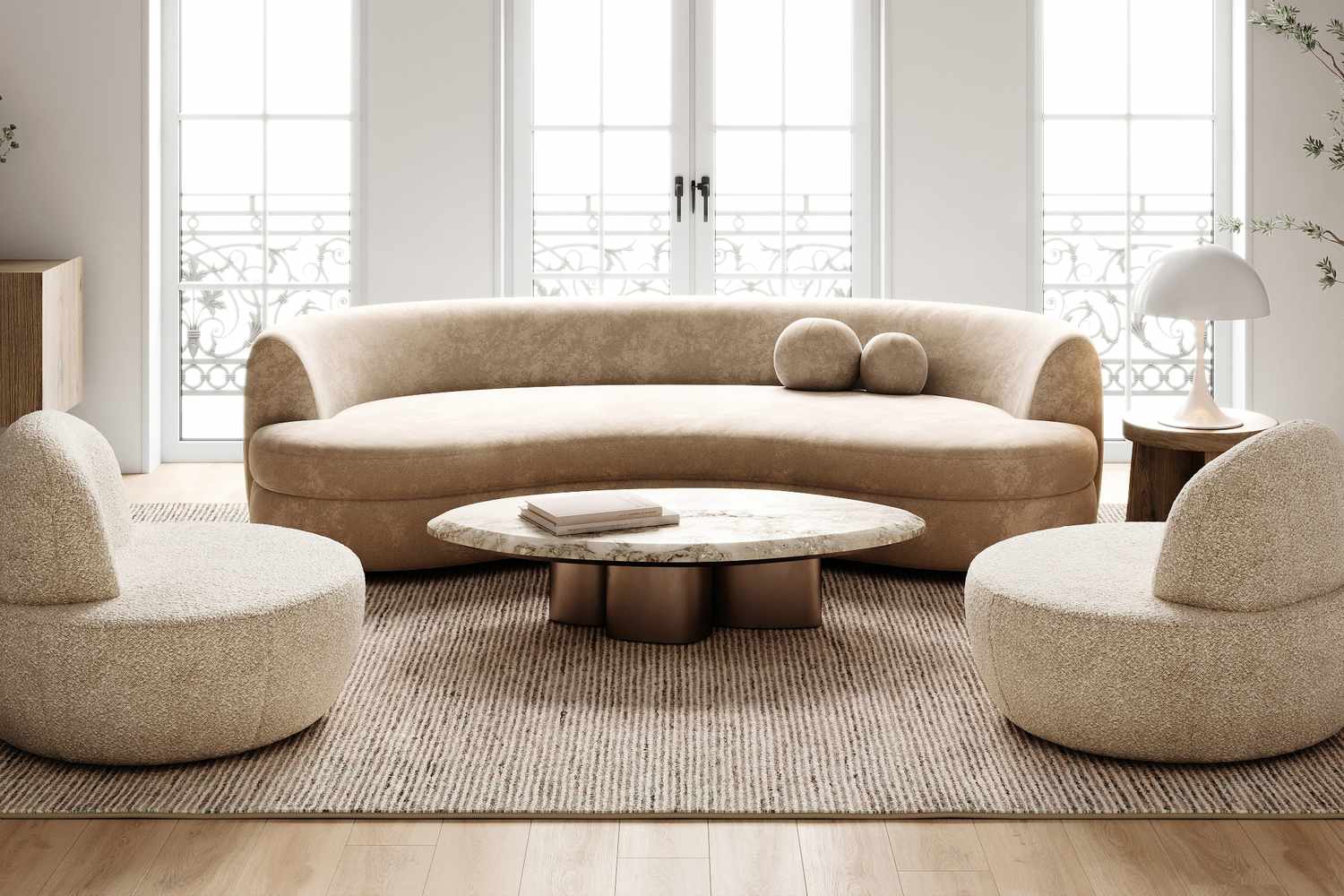 A modern living room setup featuring a round center table and circular furniture