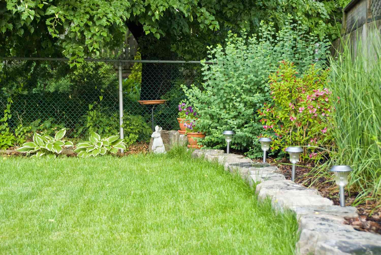Manicured lawn with boulder edging