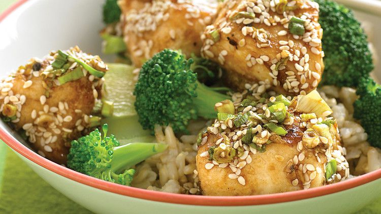 sesame chicken on green plate