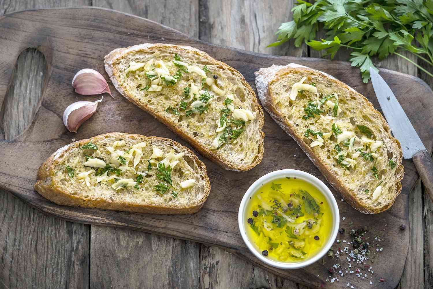 garlic bread on rustic wooden table