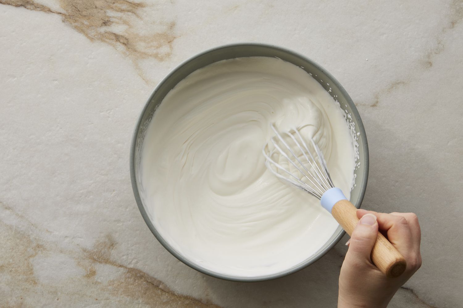 Whipping cream in bowl