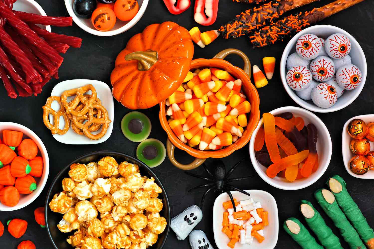 Bowls of Halloween candy on a table. 