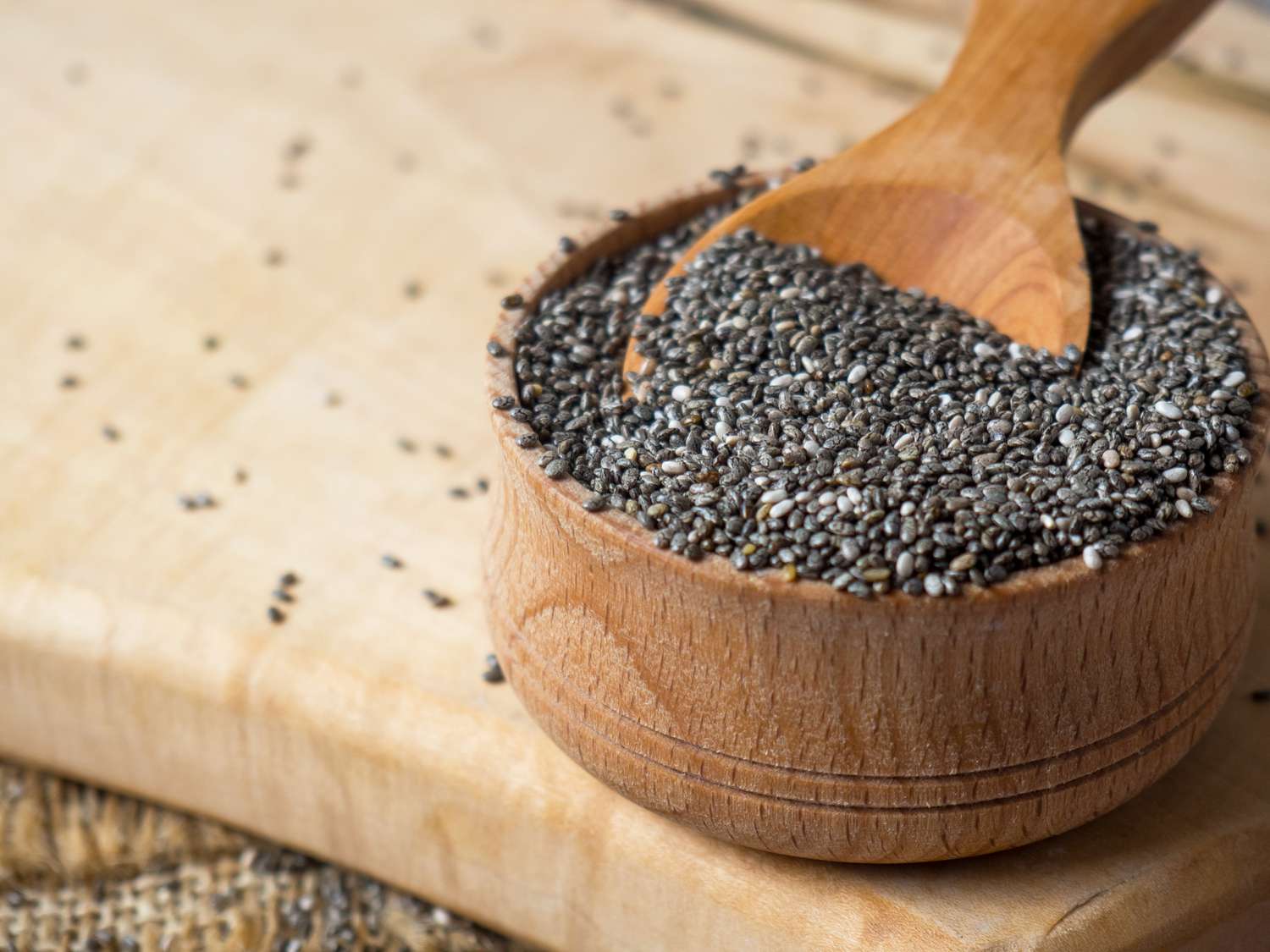 Chia seeds in a wooden bowl