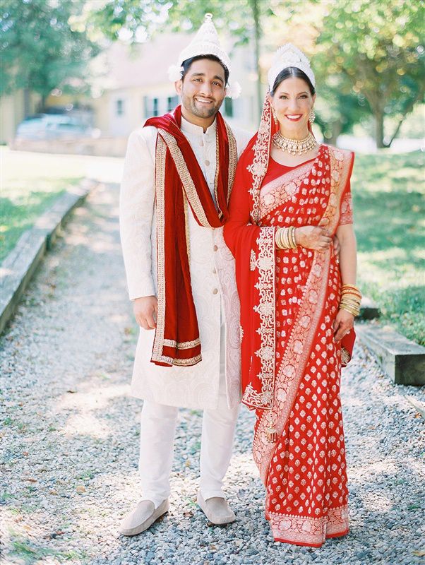 wedding couple in traditional red hindu wedding attire