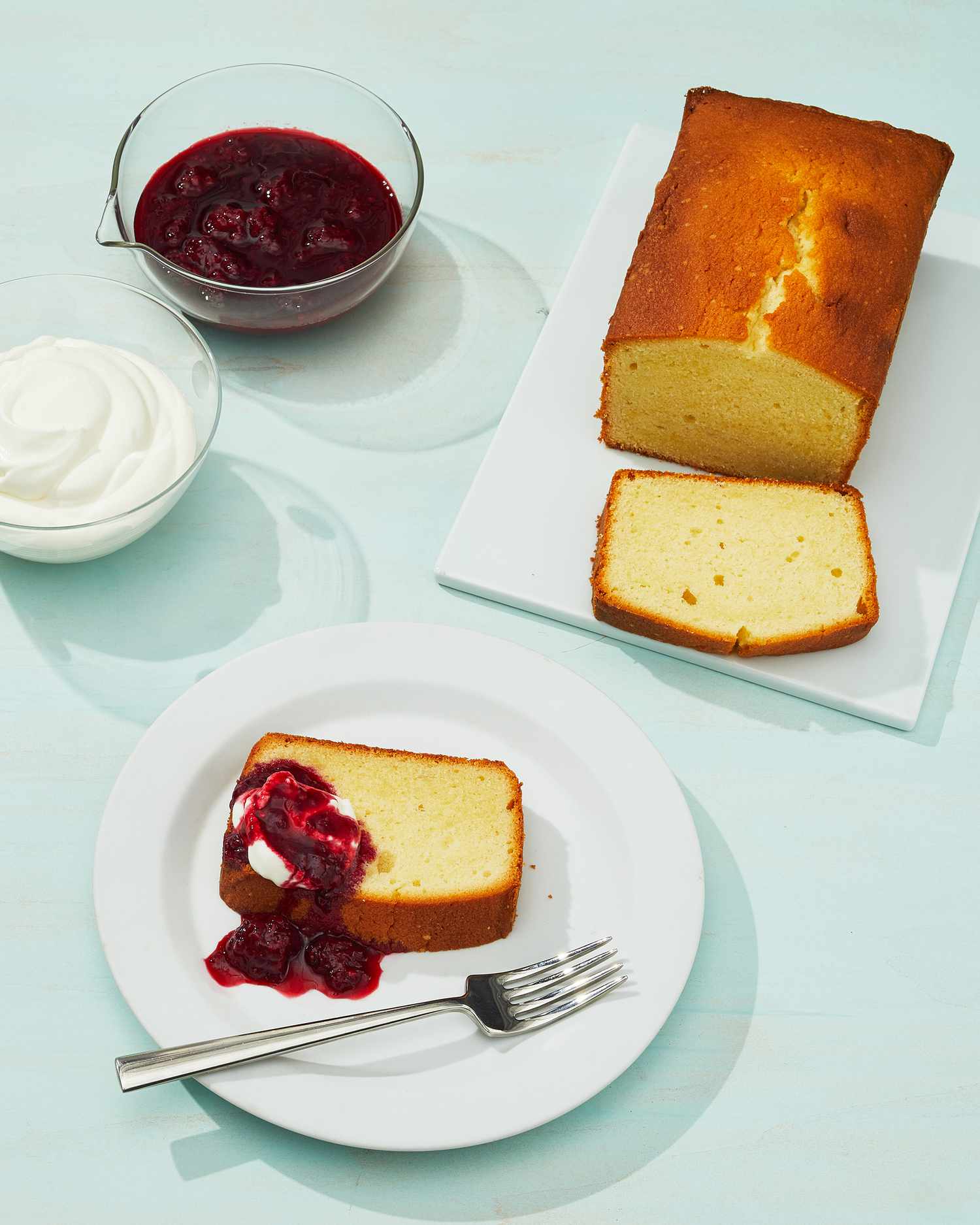 cream cheese pound cake with jam on sea foam green table