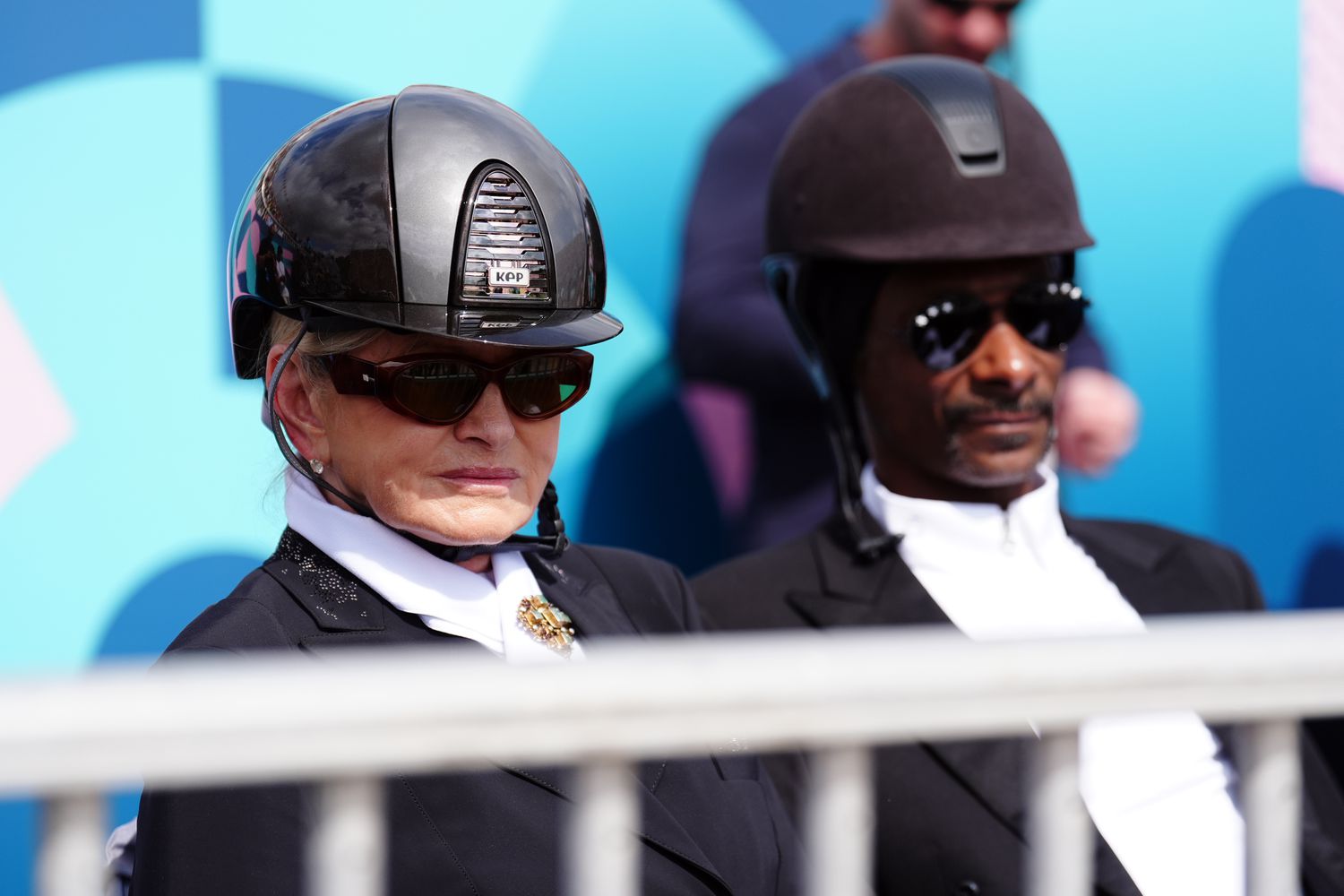 Snoop Dogg and decorvow watching the Dressage Team Grand Prix Special at the Chateau de Versailles on the eighth day of the 2024 Paris Olympic Games in France. Picture date: Saturday August 3, 2024. (Photo by Mike Egerton/PA Images via Getty Images)