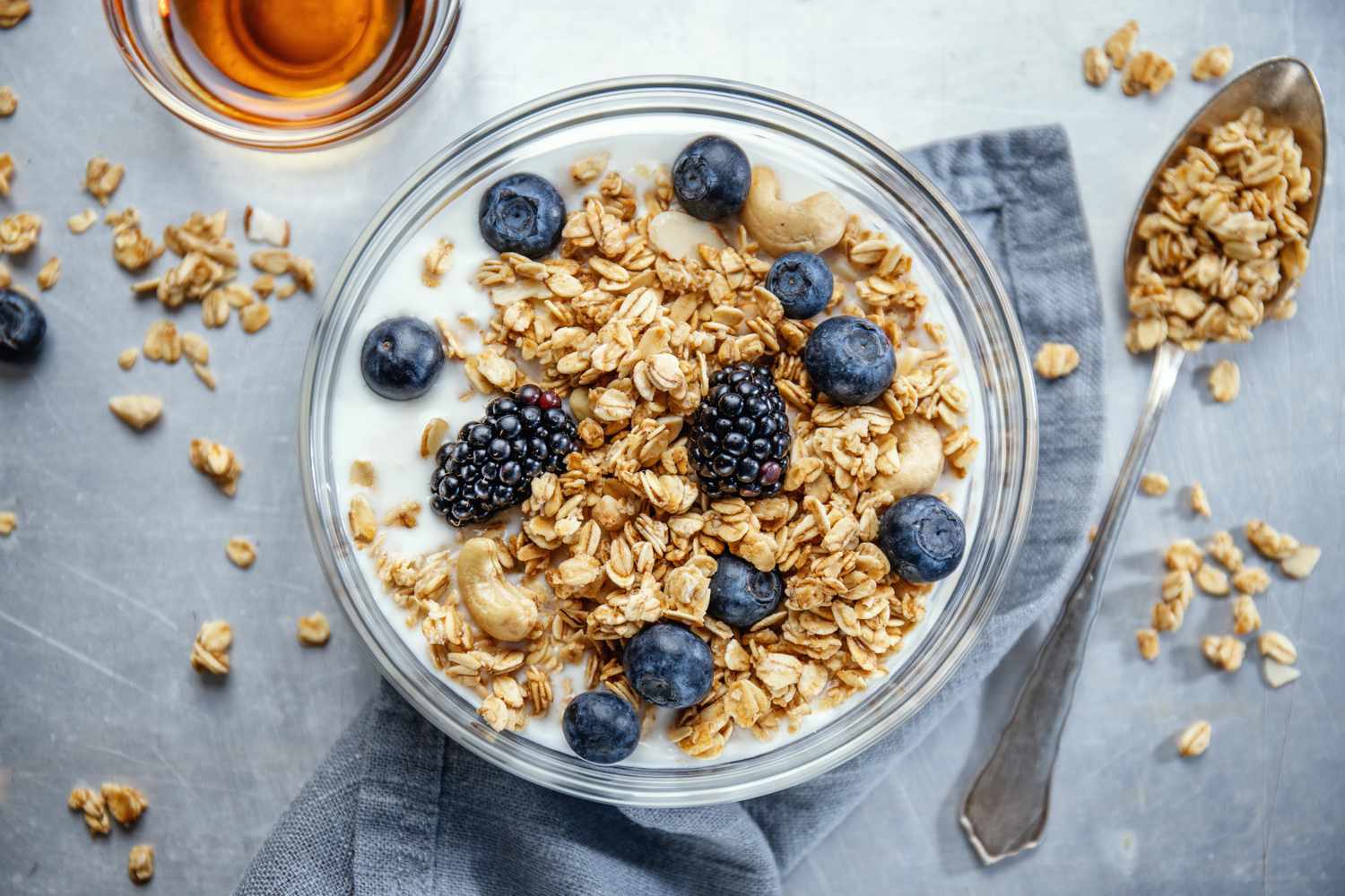 bowl of granola with milk and berries