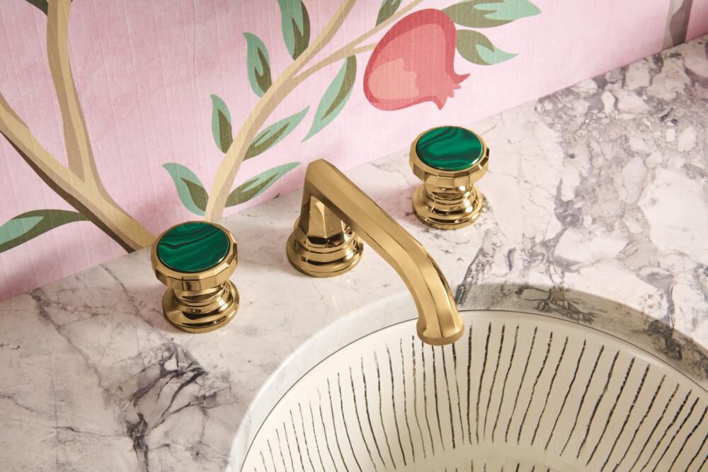 gold sink with green knobs