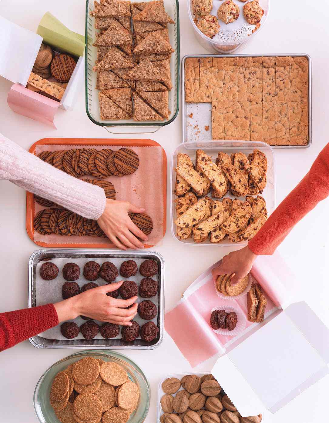 hands reaching for cookies