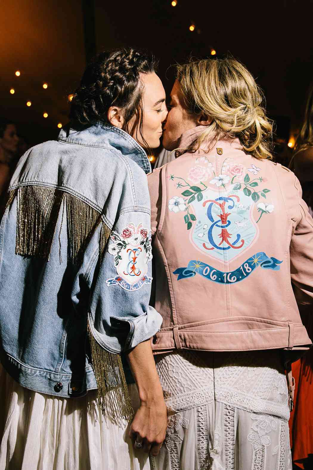 brides wearing custom designed leather and jean jackets
