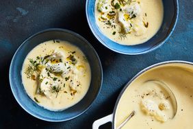fish-soup avgolemono served with fresh herbs