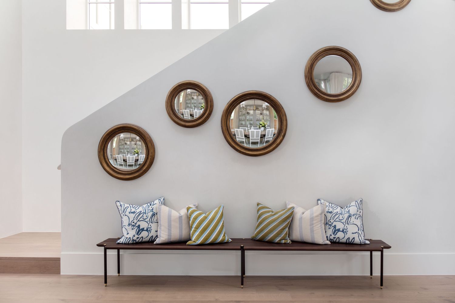 Mirrors under stairwell