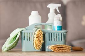 Basket with cleaning supplies