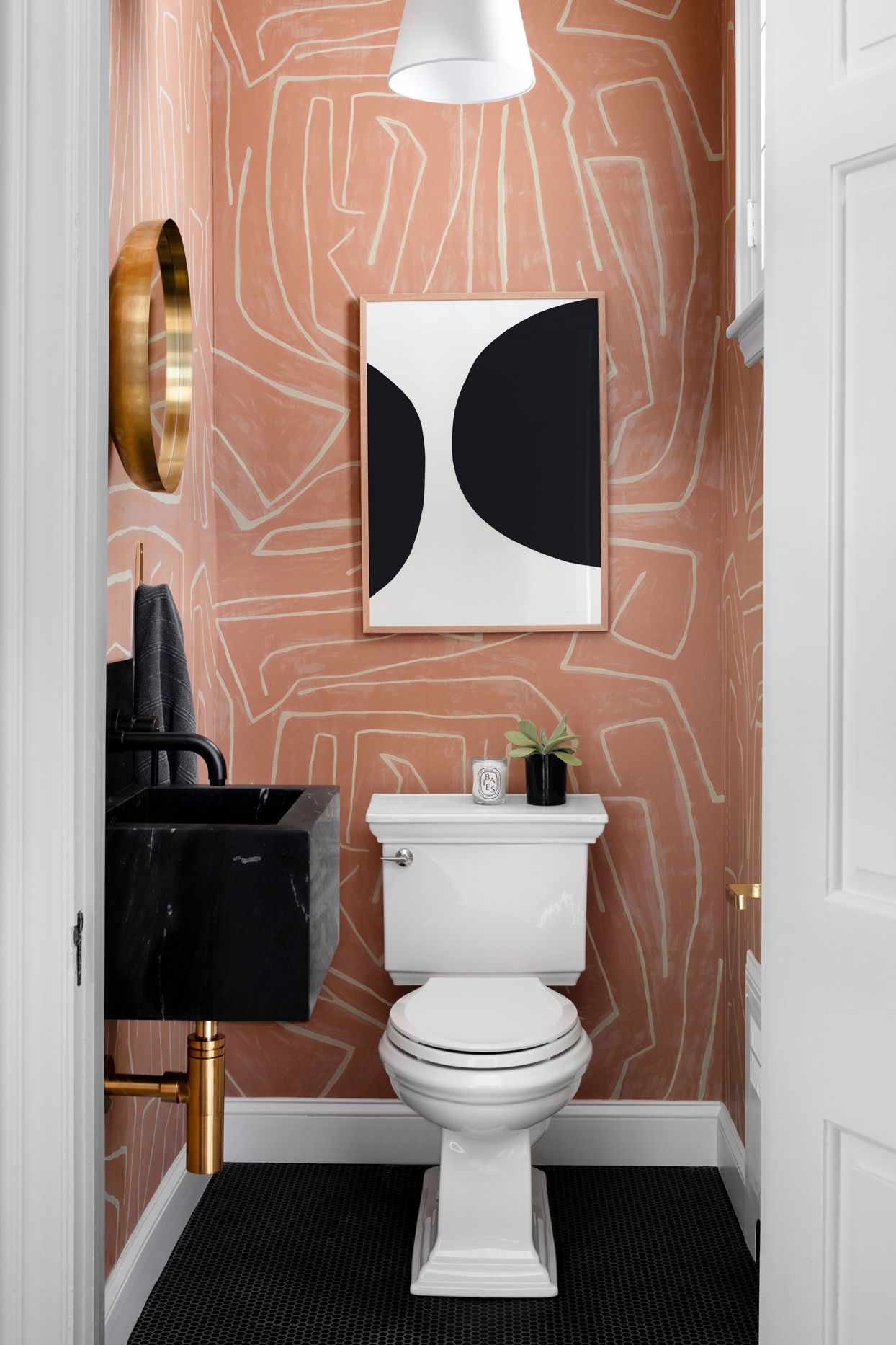 salmon and white geometric print bathroom walls