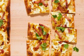 alsatian flatbread topped with flat-leaf parsley