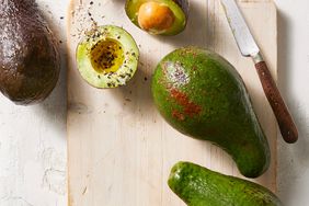 sliced avocados on cutting board