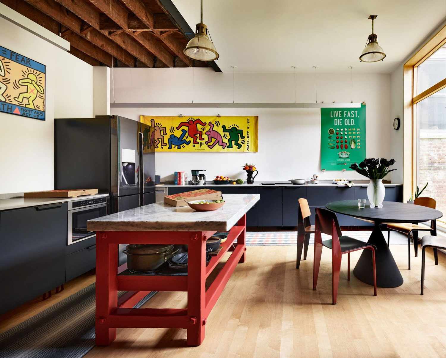 a kitchen with art