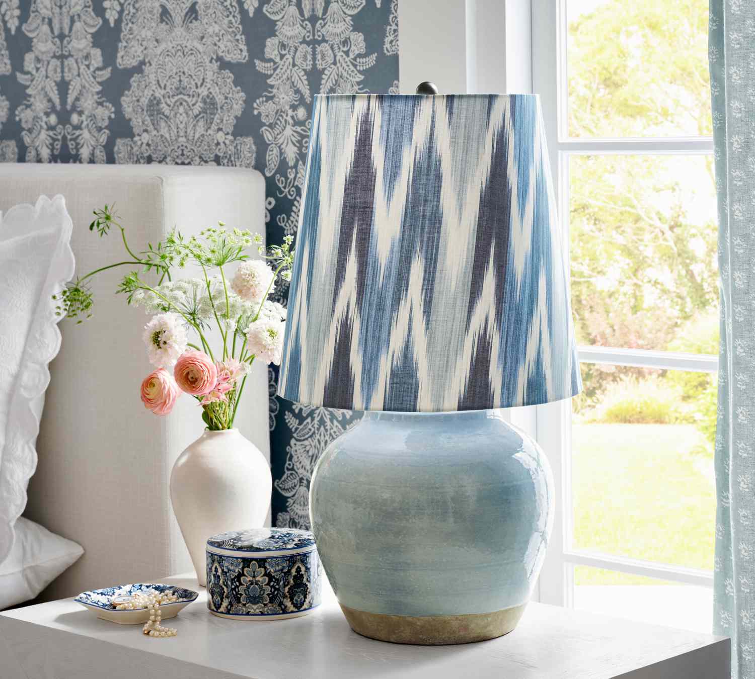 a lamp with a blue shade