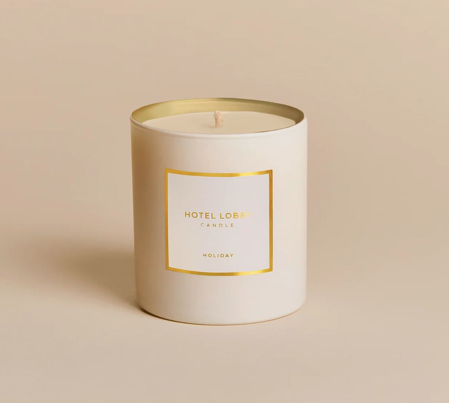 Candle labeled Hotel Lobby Candle Holiday in minimalistic design