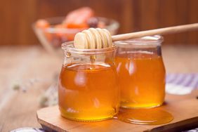 honey in jars with dipper