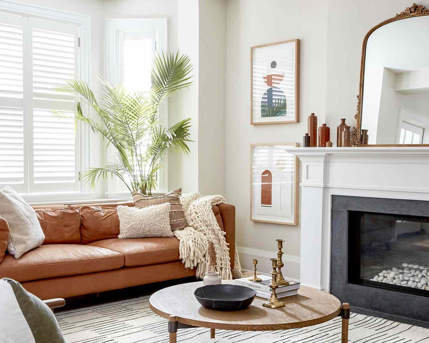 Living room with fireplace and leather sofa