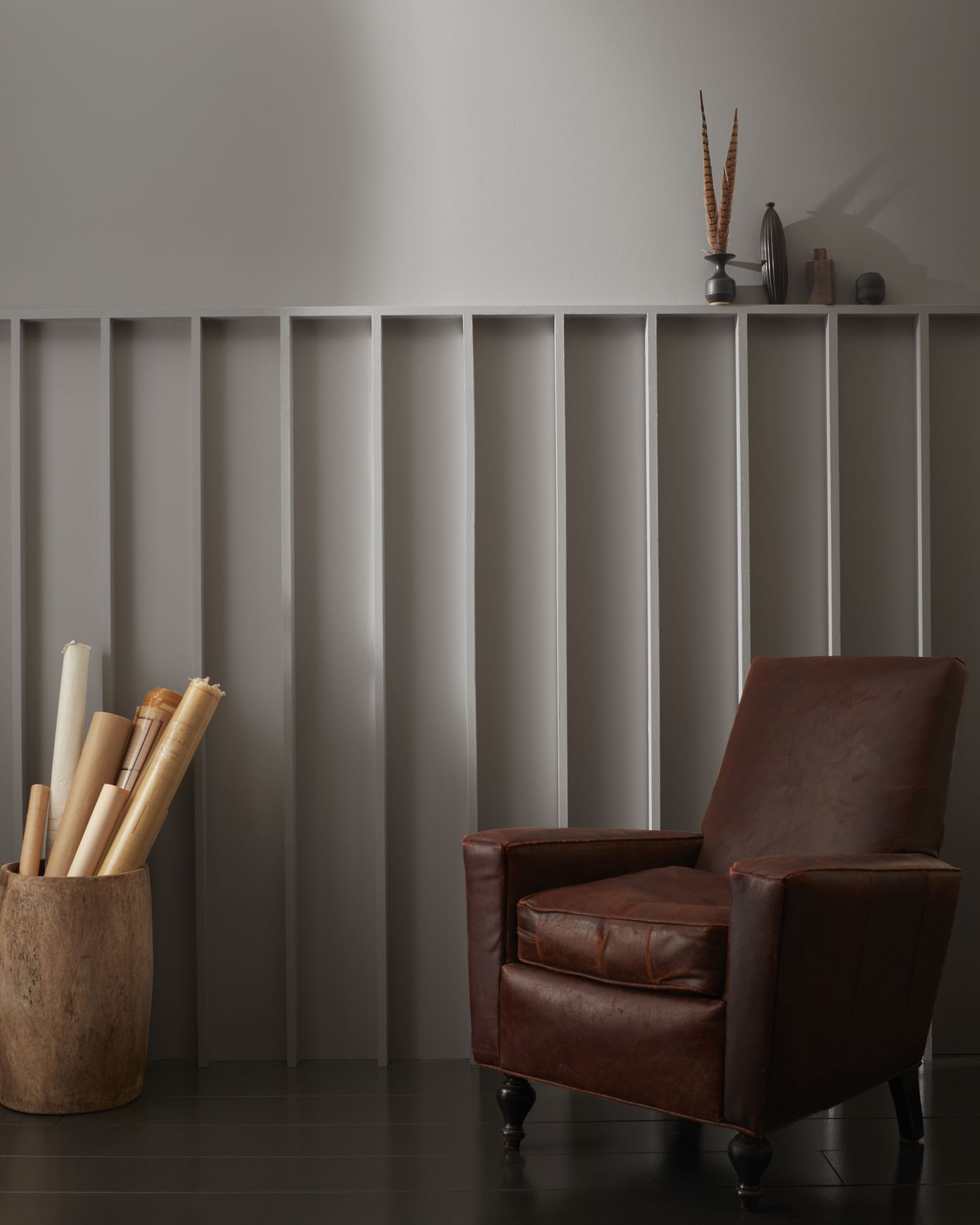 gray room with brown chair