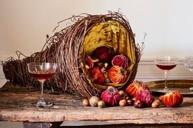 Velvet-lined cornucopia with velvet pumpkins coming out of it