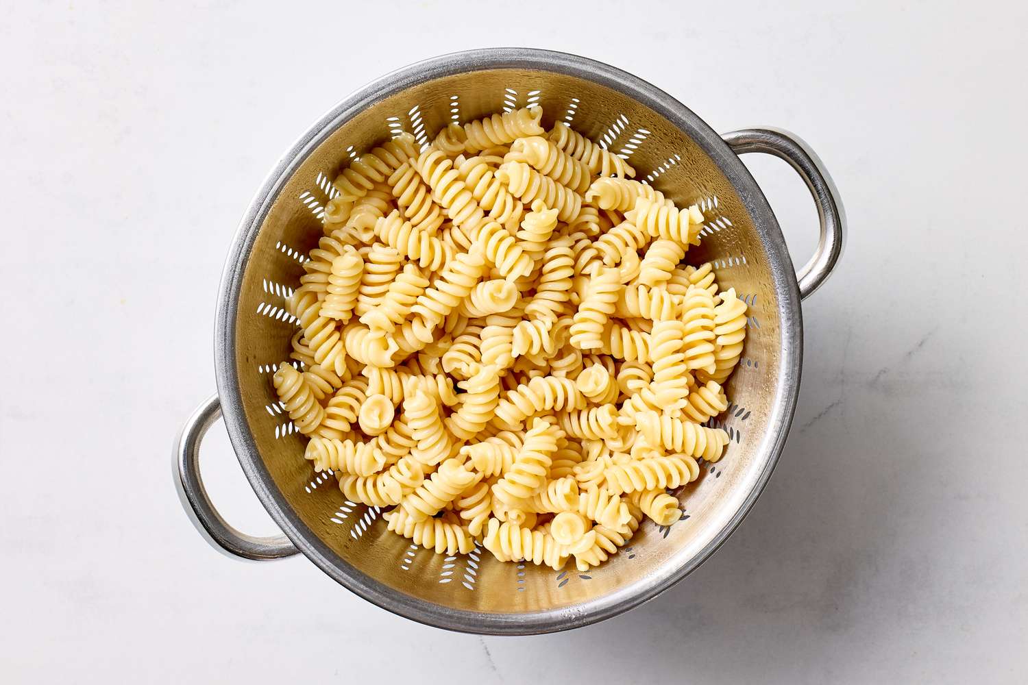 Cooked pasta in a colander