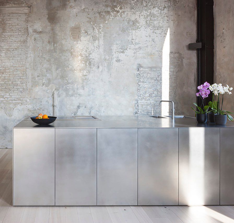 Minimal kitchen with stainless steel cabinets