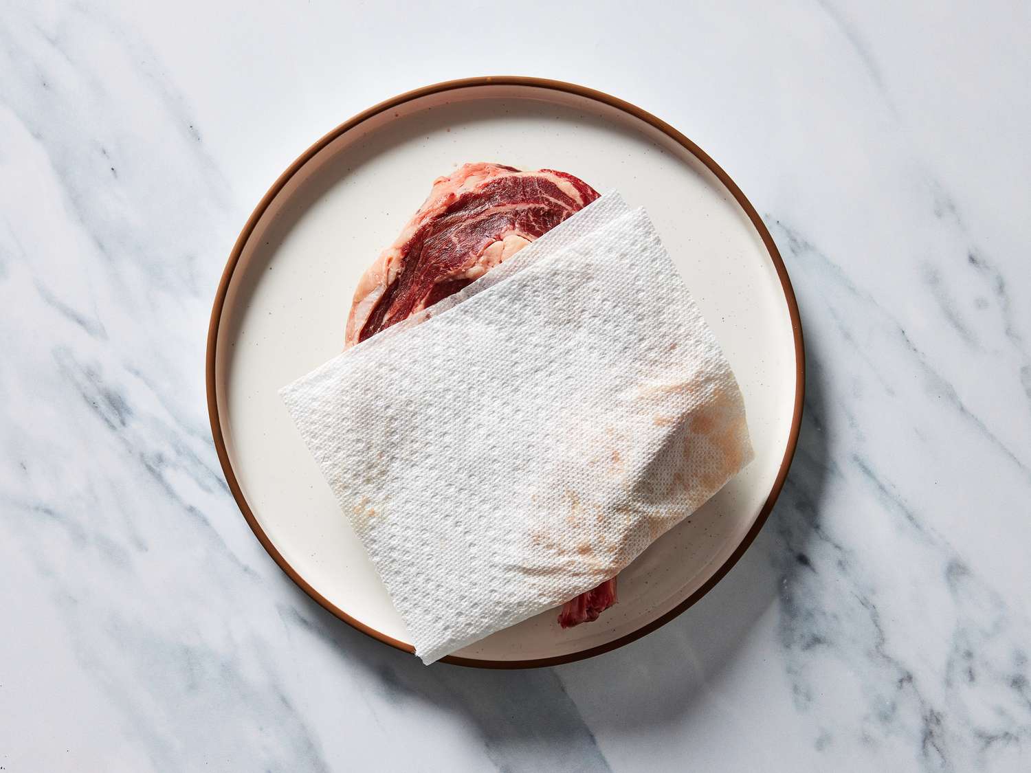 Steak resting with paper towel