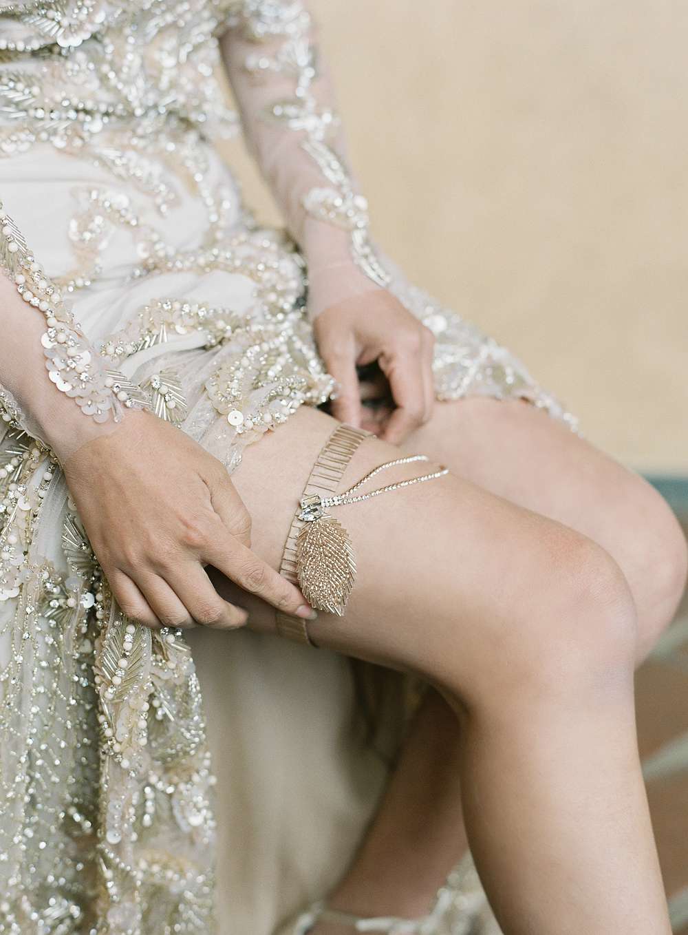 emme daji wedding bride adjusting gold garter