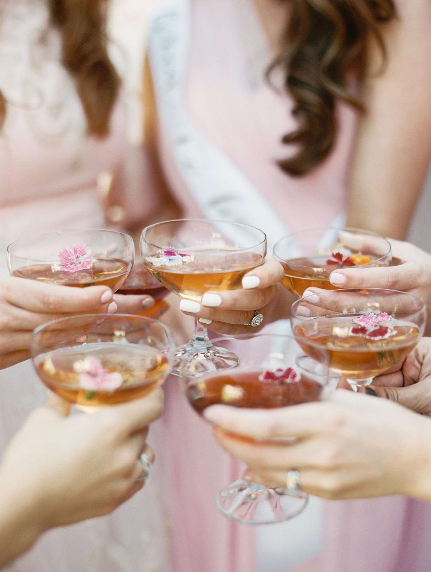 women toasting with cocktails