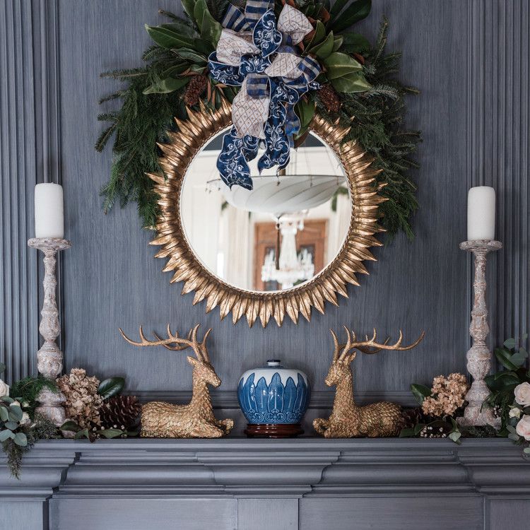 holiday mantle with gold details mirror