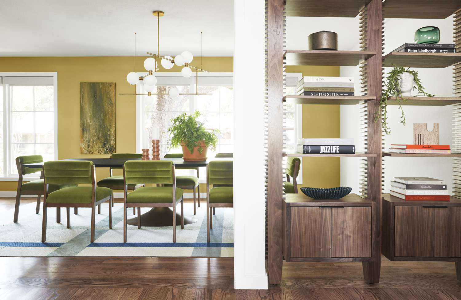 Bookshelf with dining room in the background