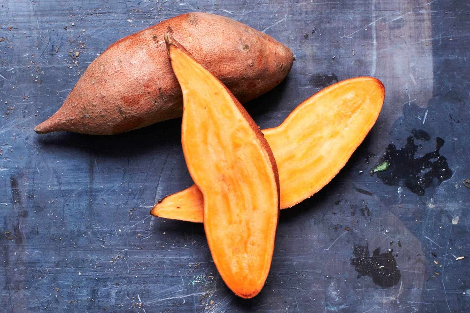 sweet potatoes on blue background