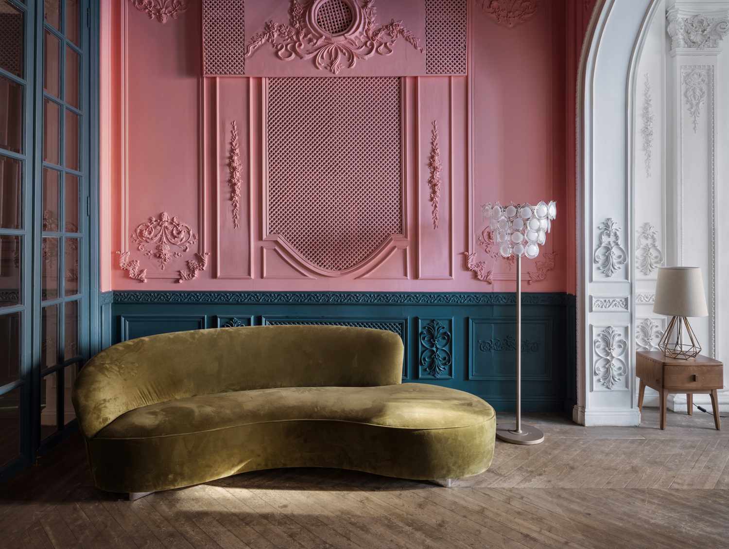 a curved sofa in a room