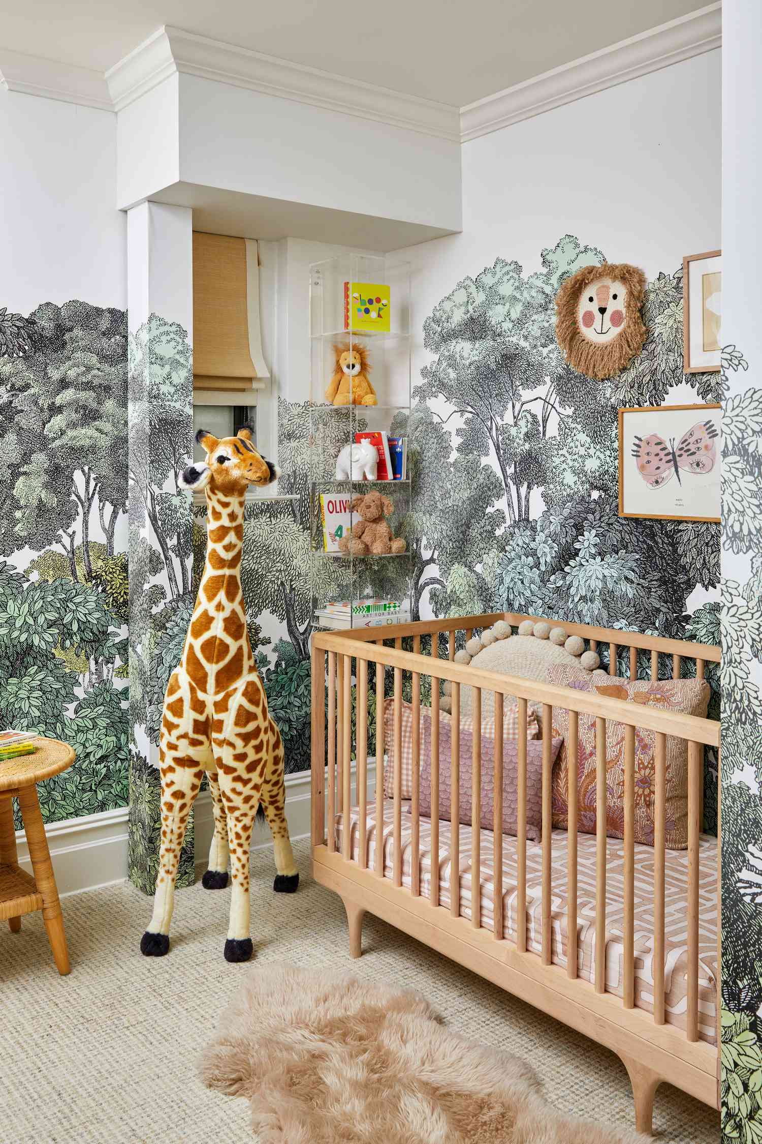 Kid's room with mural wallpaper and animal toys