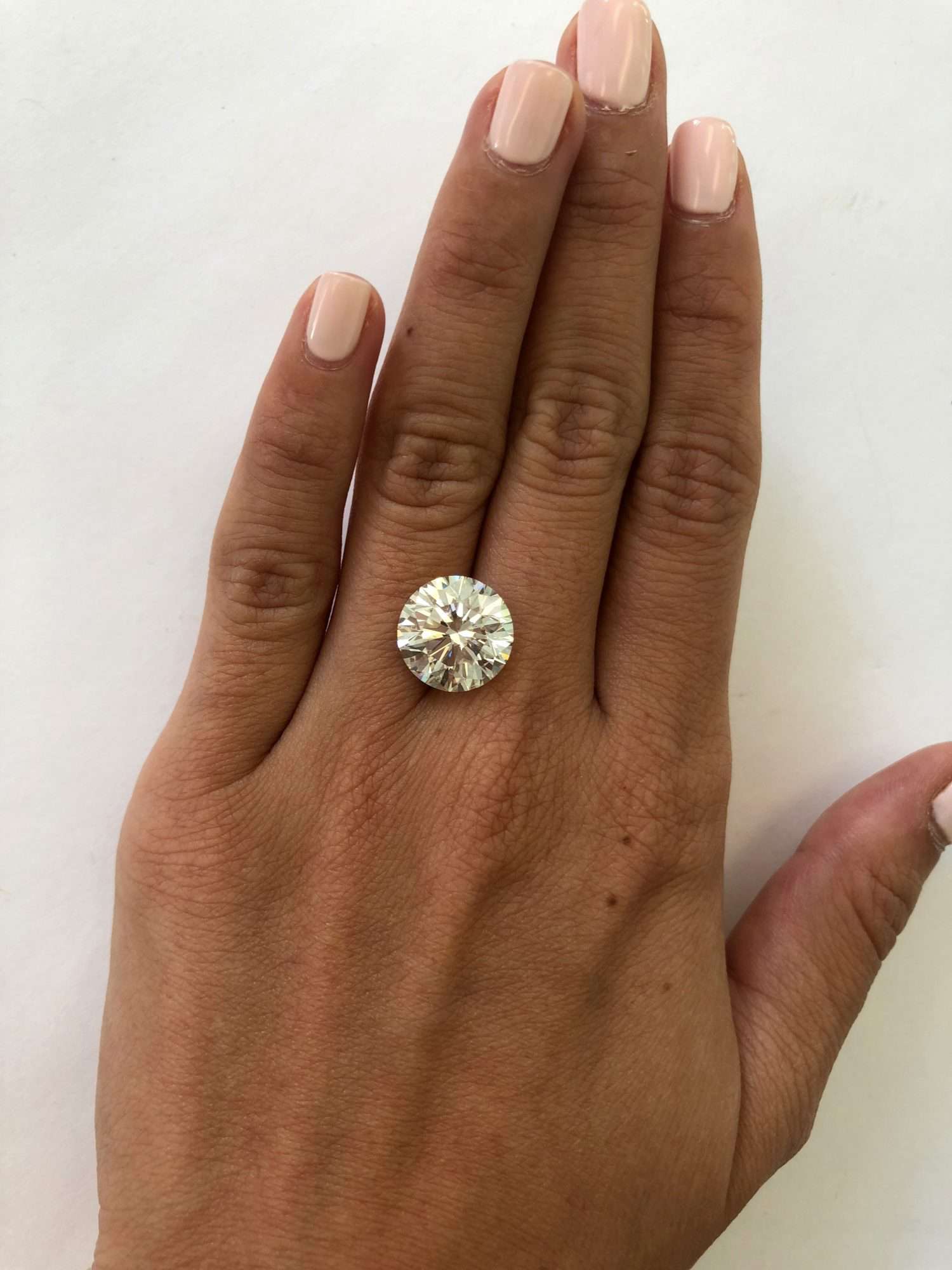 hand with 7 carat diamond