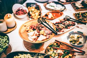 A table filled with a variety of dishes and foods