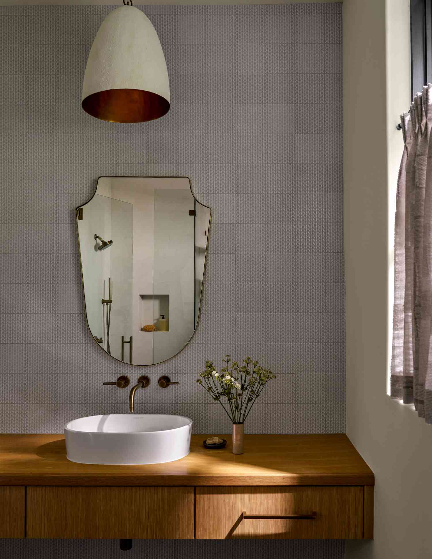 a gray bathroom tile room