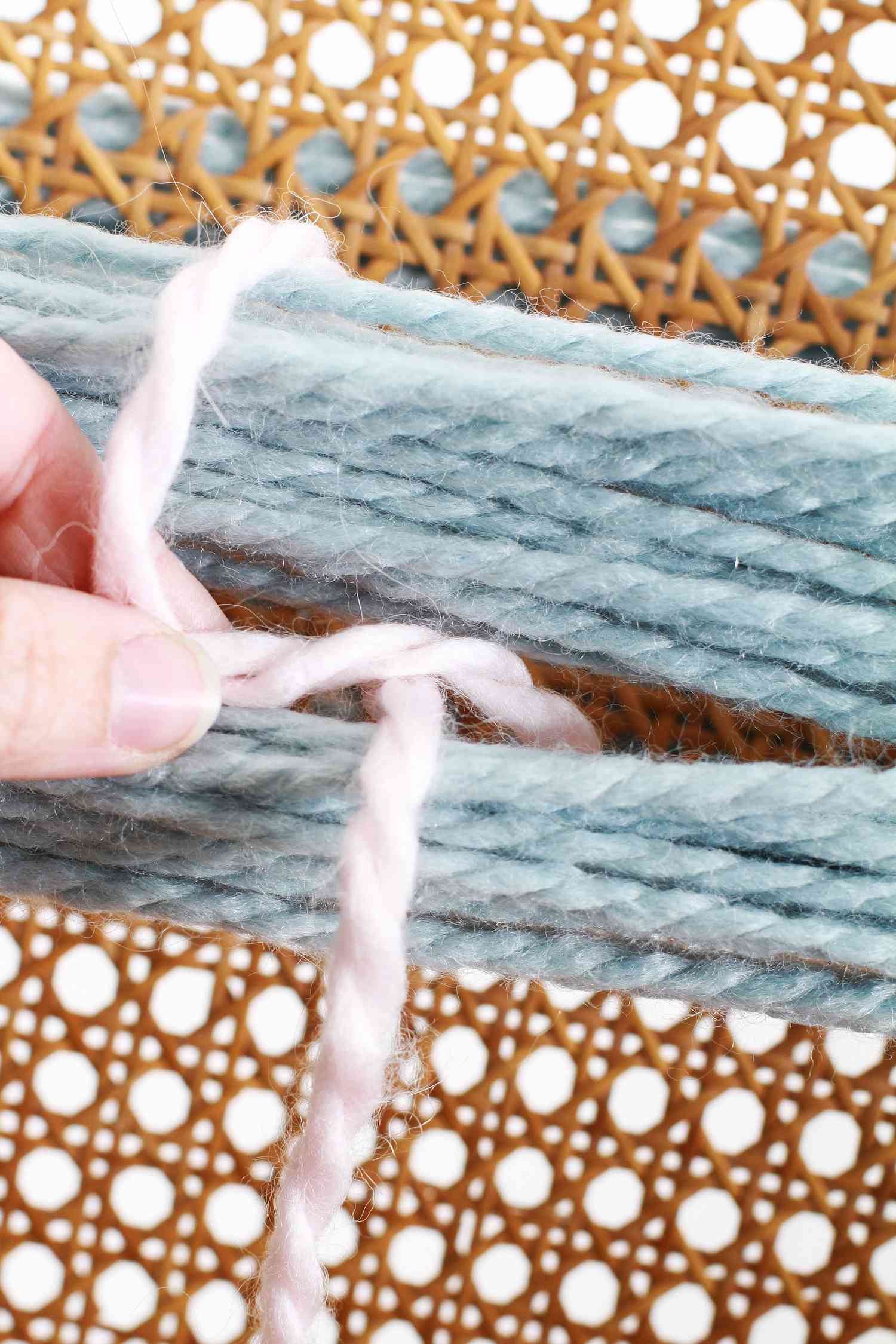 forming yarn known around wrapped blue yarn