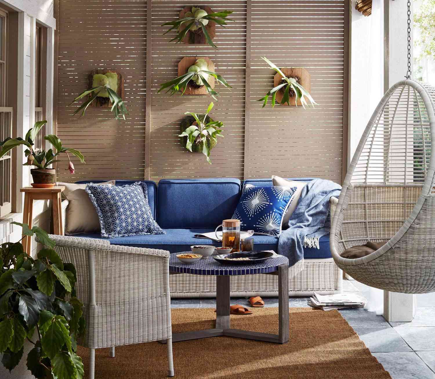 Patio with couch and swinging chair