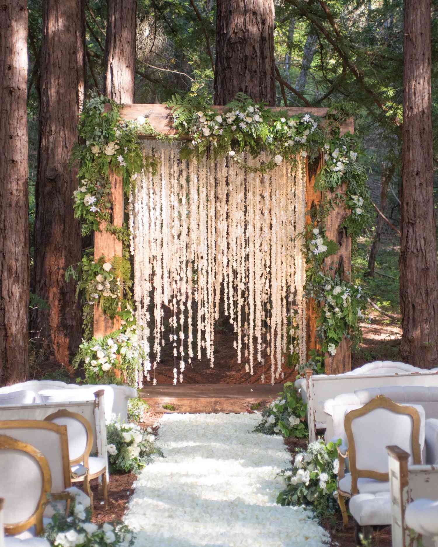 Unkempt Willow Branch Wedding Arch with Pink and Orange Flowers