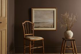 Painted room with chair and decor. 