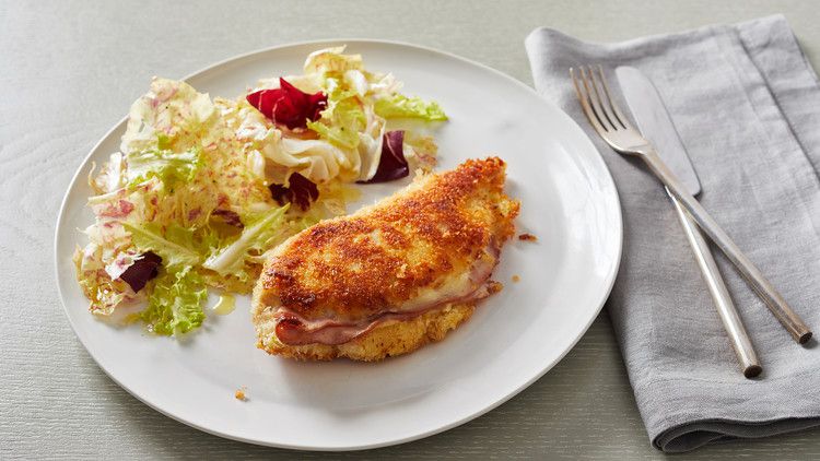 chicken cordon bleu on white plate