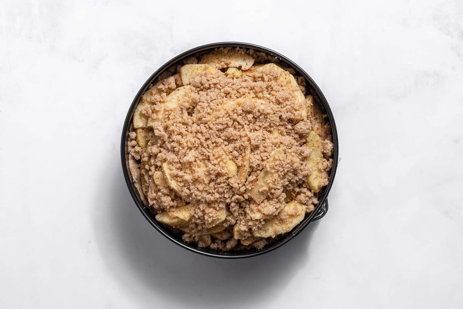 apple pie cake assembled and ready to bake